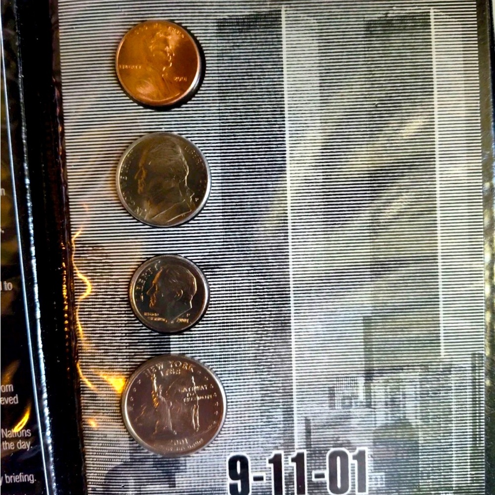 9/11 Commemorative Timeline & Coin Collection Binder. Coins Sealed as purchased.